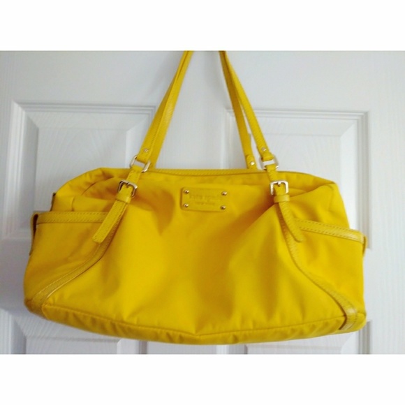 kate spade Handbags - Authentic yellow kate spade nylon/leather purse!